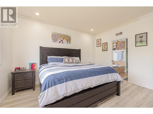 Primary Bedroom - 1791 23 Street Ne, Salmon Arm, BC - Indoor Photo Showing Bedroom