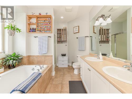 5 piece ensuite with soaker tub, shower and double sink - 1791 23 Street Ne, Salmon Arm, BC - Indoor Photo Showing Bathroom