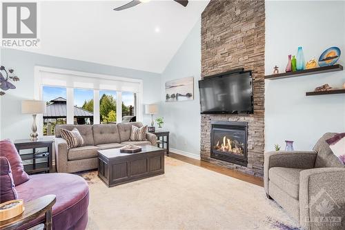 28 Yanik Street, Limoges, ON - Indoor Photo Showing Living Room With Fireplace