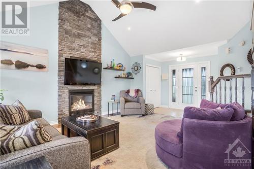 28 Yanik Street, Limoges, ON - Indoor Photo Showing Living Room With Fireplace