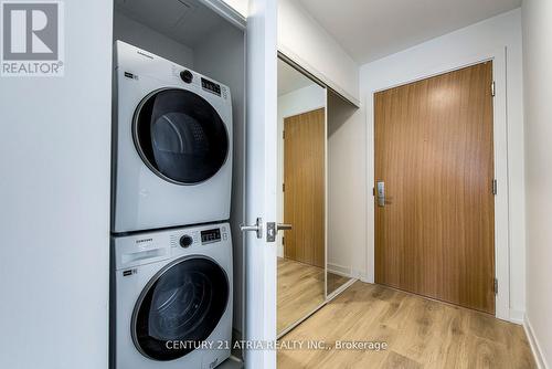 705 - 150 Logan Avenue, Toronto, ON - Indoor Photo Showing Laundry Room