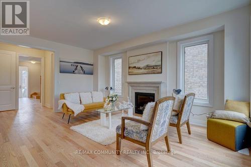 59 Hoad Street, Clarington, ON - Indoor Photo Showing Living Room With Fireplace