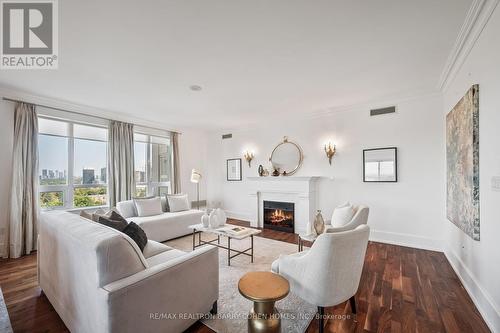 805C - 662 Sheppard Avenue E, Toronto, ON - Indoor Photo Showing Living Room With Fireplace