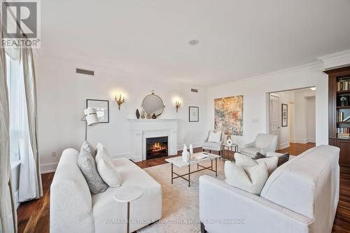 805C - 662 Sheppard Avenue E, Toronto, ON - Indoor Photo Showing Living Room With Fireplace