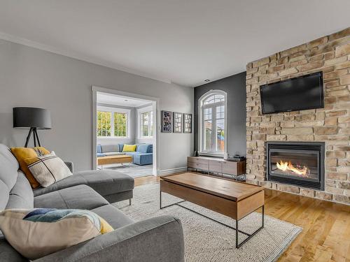 Salon - 188 Rue Elmina-Anger, Québec (Charlesbourg), QC - Indoor Photo Showing Living Room With Fireplace