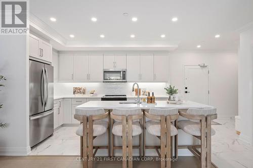 110 - 1560 Upper West Avenue, London, ON - Indoor Photo Showing Kitchen With Stainless Steel Kitchen With Upgraded Kitchen