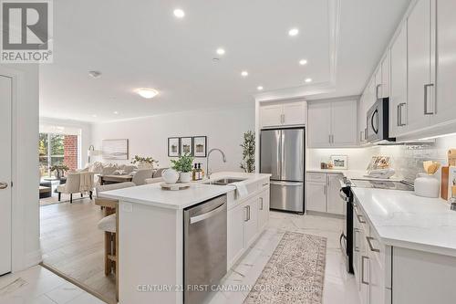 110 - 1560 Upper West Avenue, London, ON - Indoor Photo Showing Kitchen With Stainless Steel Kitchen With Double Sink With Upgraded Kitchen