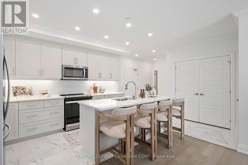 110 - 1560 Upper West Avenue, London, ON - Indoor Photo Showing Kitchen With Stainless Steel Kitchen With Upgraded Kitchen