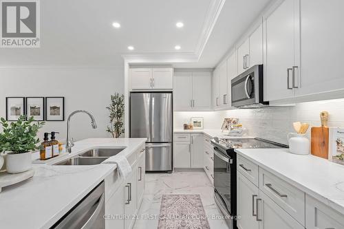 110 - 1560 Upper West Avenue, London, ON - Indoor Photo Showing Kitchen With Stainless Steel Kitchen With Double Sink With Upgraded Kitchen