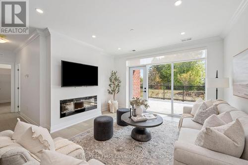 110 - 1560 Upper West Avenue, London, ON - Indoor Photo Showing Living Room With Fireplace