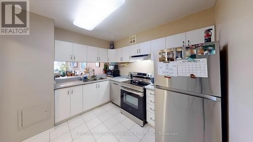 310 - 236 Albion Road, Toronto, ON - Indoor Photo Showing Kitchen With Double Sink