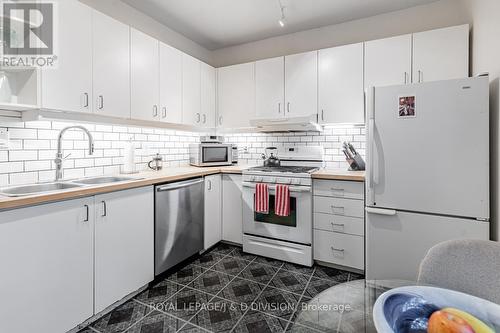 39 Delaware Avenue, Toronto, ON - Indoor Photo Showing Kitchen With Double Sink