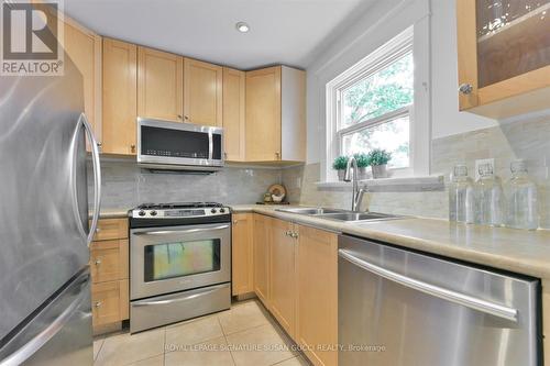 707 Sammon Avenue, Toronto, ON - Indoor Photo Showing Kitchen With Double Sink