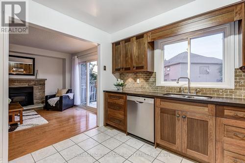 65 Tideswell Boulevard, Toronto, ON - Indoor Photo Showing Kitchen With Fireplace With Double Sink