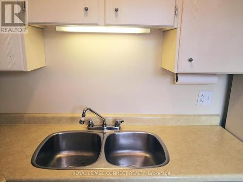 1-303 - 50 Old Kingston Road, Toronto, ON - Indoor Photo Showing Kitchen With Double Sink