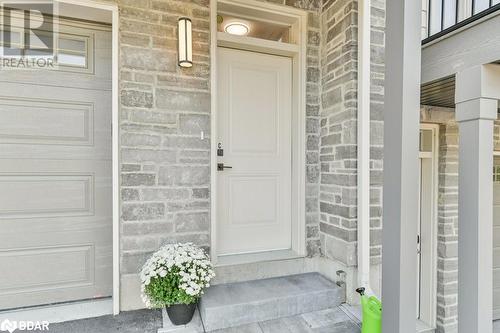 Rear entrance of touwhouse - 73C Bridge Street E, Picton, ON -  With Exterior