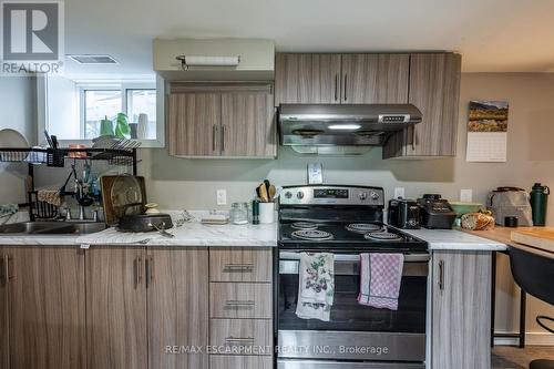 87 Hillview Street, Hamilton, ON - Indoor Photo Showing Kitchen With Double Sink