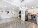 Family room - 2-4410 Ch. Des Cageux, Laval (Chomedey), QC  - Indoor Photo Showing Kitchen 