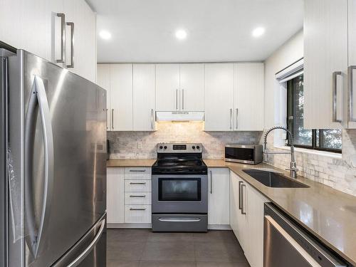 Cuisine - 2-4410 Ch. Des Cageux, Laval (Chomedey), QC - Indoor Photo Showing Kitchen With Upgraded Kitchen