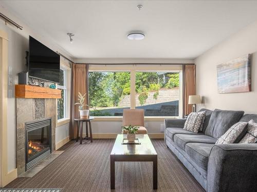 217-1600 Stroulger Rd, Nanoose Bay, BC - Indoor Photo Showing Living Room With Fireplace