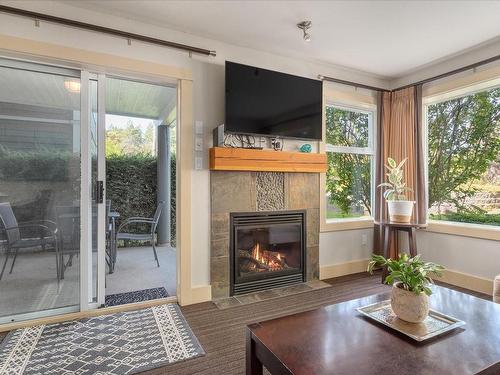 217-1600 Stroulger Rd, Nanoose Bay, BC - Indoor Photo Showing Living Room With Fireplace