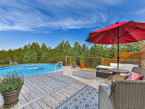 Terrasse - 359  - 363 Ch. Avila, Piedmont, QC - Outdoor With Above Ground Pool