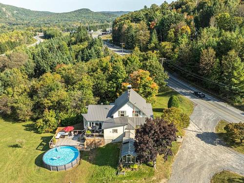 Photo aÃ©rienne - 359  - 363 Ch. Avila, Piedmont, QC - Outdoor With Above Ground Pool With View