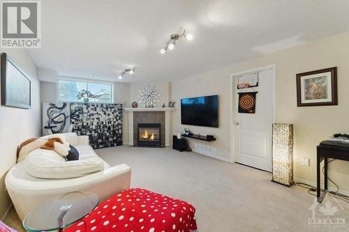 1436 Comfrey Crescent, Ottawa, ON - Indoor Photo Showing Other Room With Fireplace