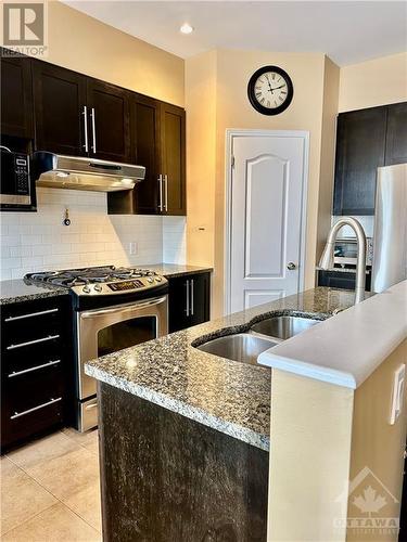 1436 Comfrey Crescent, Ottawa, ON - Indoor Photo Showing Kitchen With Stainless Steel Kitchen With Double Sink With Upgraded Kitchen