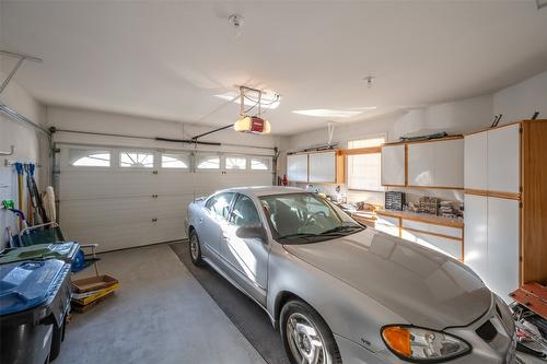 145-1634 Carmi Avenue, Penticton, BC - Indoor Photo Showing Garage