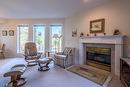 145-1634 Carmi Avenue, Penticton, BC  - Indoor Photo Showing Living Room With Fireplace 