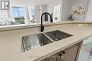 603 - 1625 Pickering Parkway, Pickering (Village East), ON  - Indoor Photo Showing Kitchen With Double Sink 