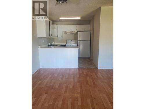 1451-1455 Milburn Avenue, Prince George, BC - Indoor Photo Showing Kitchen With Double Sink