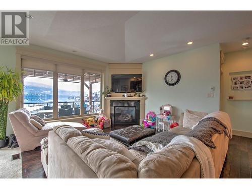 8764 Hofer Drive, Coldstream, BC - Indoor Photo Showing Living Room With Fireplace