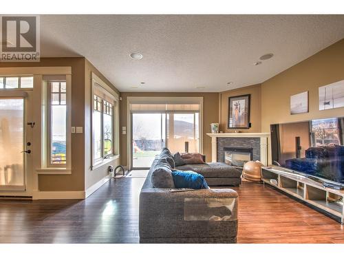 8764 Hofer Drive, Coldstream, BC - Indoor Photo Showing Living Room With Fireplace