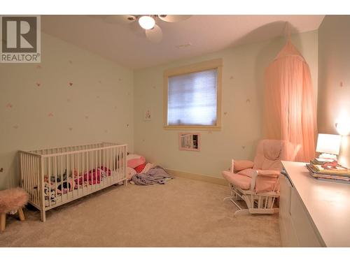 8764 Hofer Drive, Coldstream, BC - Indoor Photo Showing Bedroom