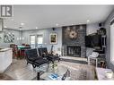 706 Renshaw Road, Kelowna, BC  - Indoor Photo Showing Living Room With Fireplace 