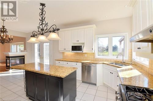 4358 Latimer Crescent, Burlington, ON - Indoor Photo Showing Kitchen With Fireplace With Double Sink