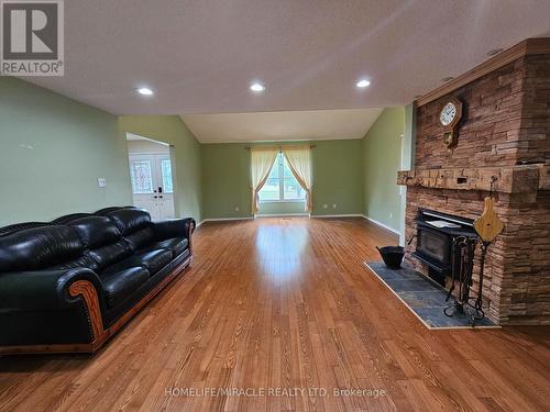 6306 Crickadorn Court, Mississauga, ON - Indoor Photo Showing Living Room With Fireplace