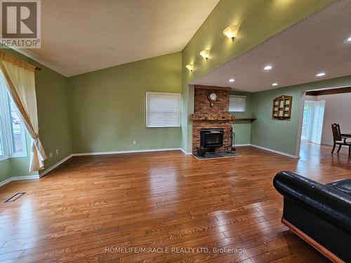 6306 Crickadorn Court, Mississauga, ON - Indoor Photo Showing Living Room With Fireplace