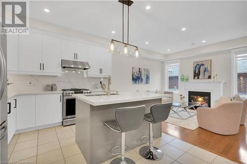 3079 Neyagawa Boulevard, Oakville, ON - Indoor Photo Showing Kitchen With Fireplace With Upgraded Kitchen