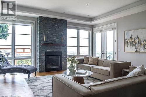 Hardwood Floors, Floor To Ceiling Windows and Fireplace - 147 Mountain Park Avenue, Hamilton, ON - Indoor Photo Showing Living Room With Fireplace