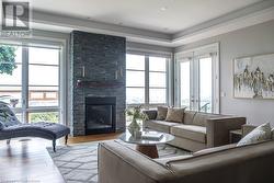 Hardwood Floors, Floor To Ceiling Windows and Fireplace - 