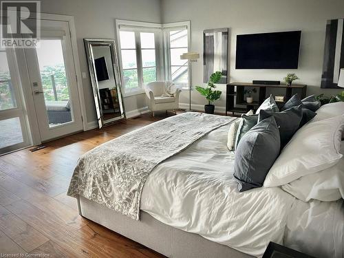 Primary Bedroom, Gleaming Hardwood, A Wall Of Windows Looking  Out to Lake Ontario - 147 Mountain Park Avenue, Hamilton, ON - Indoor Photo Showing Bedroom