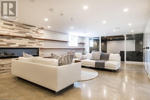 Beautiful and Bright Recreation Room - 147 Mountain Park Avenue, Hamilton, ON - Indoor Photo Showing Living Room With Fireplace