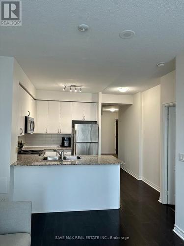 310 - 225 Webb Drive, Mississauga, ON - Indoor Photo Showing Kitchen With Double Sink