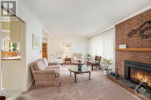 7 Edgebrook Road, Ottawa, ON - Indoor Photo Showing Living Room With Fireplace