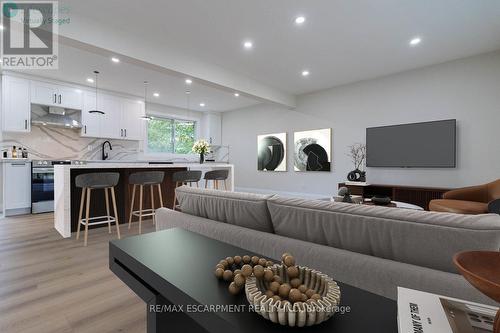 1 - 176 Mohawk Road W, Hamilton, ON - Indoor Photo Showing Living Room