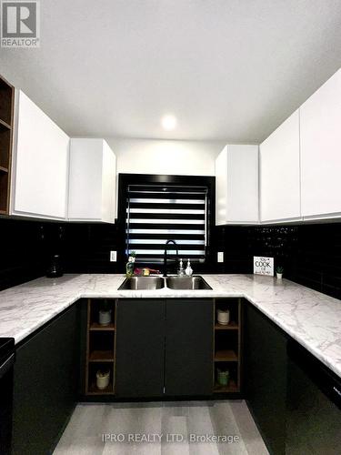 4985 Crysler Avenue, Niagara Falls, ON - Indoor Photo Showing Kitchen With Double Sink