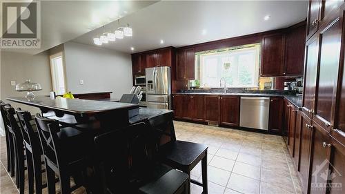 Primary Residence Kitchen open to Living & Dining Rooms - 103 Lady Slipper Way, Carp, ON - Indoor Photo Showing Kitchen With Upgraded Kitchen